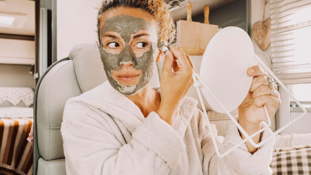 Woman Applying face mask